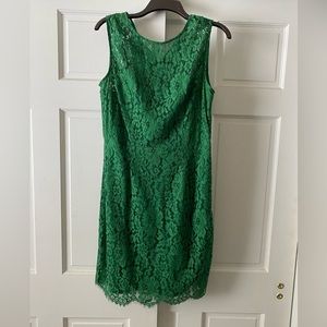 Green lacy Eva Mendez New York and company dress. Bows in the back